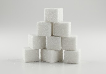 A pyramid made of sugar cubes on a white background in a studio shot with soft diffused lighting