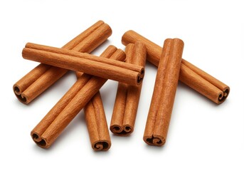 A group of cinnamon sticks are displayed on a white surface in a simple and clean composition style