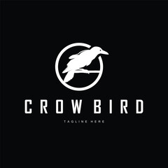 crow logo with minimalist black silhouette depicting a majestic crow bird template symbol with simple black © Arya19