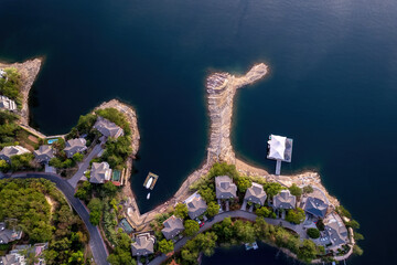 Scenic Aerial View of Luxury Lakefront Homes and Serene Waters