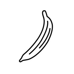 Two ripe bananas resting on a wooden table with a soft light creating a warm atmosphere