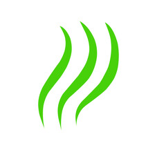 Vibrant green grass blades swaying in a gentle breeze under a bright blue sky in a serene landscape