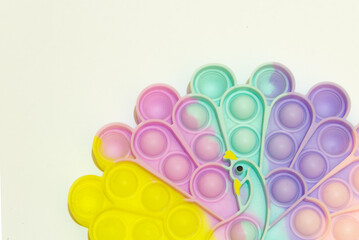 Colorful rainbow poppit relaxing game with white background