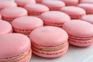 Colorful macaroons on a wooden table