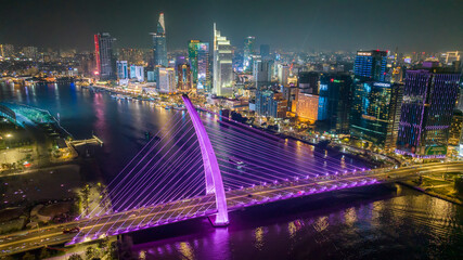 Aerial view of Ba Son Bridge at night in downtown Ho Chi Minh City, Vietnam, connecting District 1 and Thu Duc district