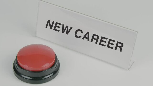 New career text or word displayed on a nameplate as a hand presses a red button, symbolizing a fresh start in professional life, set against a white background