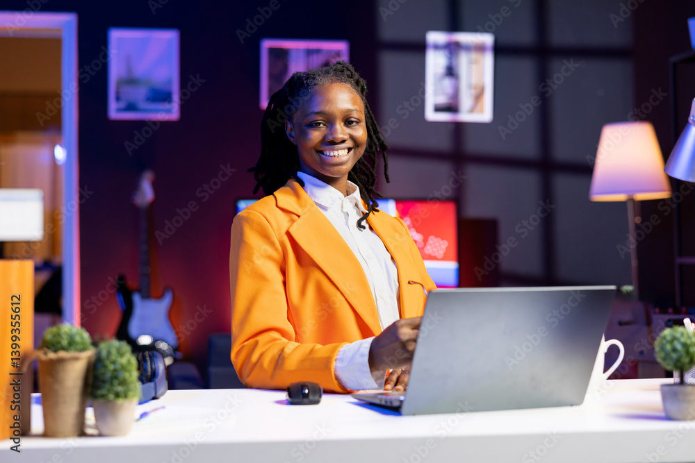 Aufkleber portrait of smiling freelancer in home office checking analytics statistical data sets on laptop. ha