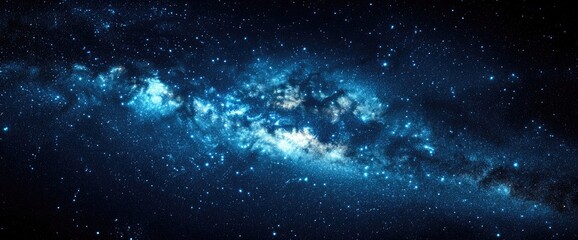 Fototapeta premium A vibrant cosmic display of stars. Light, dark blue & white hues create a celestial spectacle