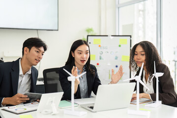 ESG Discussion and Sustainable Practices. Team strategizing on environmental initiatives using engaging visuals and models.