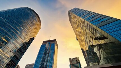 City Skyscrapers in the Golden Glow of Sunrise: Financial Hub at Dawn