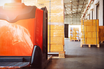 Bulk of Package Boxes Waiting to be Loaded into Containers Trucks. Forklift Pallet Jack Loader. Cartons, Cardboard Boxes. Supply Chain, Supplies Shipment. Shipping Warehouse Logistics.