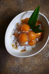 Bubur candil or biji salak in a bowl