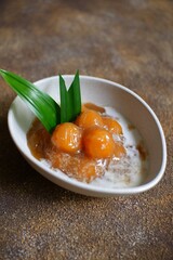 A bowl of glutinous rice balls porridge or bubur candil 