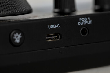 Fototapeta premium Usb-c connection for audio equipment close-up shot technology studio environment detail viewpoint connectivity innovation