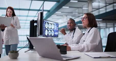 Neurologists At A Diverse Clinic Analyze Brain MRI Scans