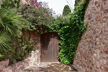 Naklejka premium Little gate Portalet in castle Villafames, the same name village