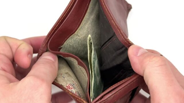 A juicy red and yellow apple rolls on a white background and stops in the center of the image