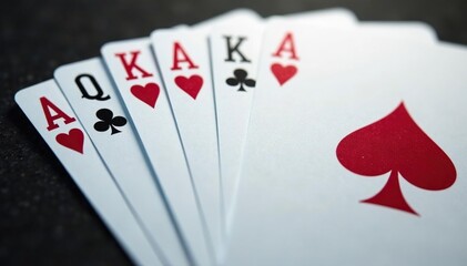 Playing cards arranged in a neat ace high sequence , spades, gambling, sequence