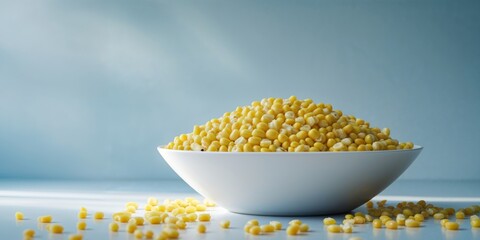 Bright Yellow Corn in Bowl on Blue Background Ideal for Snacks