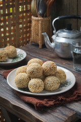 Traditional Malay Kuih Bom Bijan Fried Sesame Balls in a Cozy Lifestyle Setting