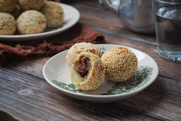 Traditional Malay Kuih Bom Bijan Fried Sesame Balls in a Cozy Lifestyle Setting