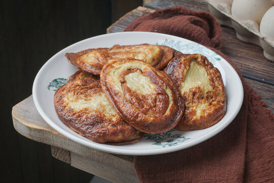 Traditional Malaysian Kuih Akok Served in a Cozy Lifestyle Setting