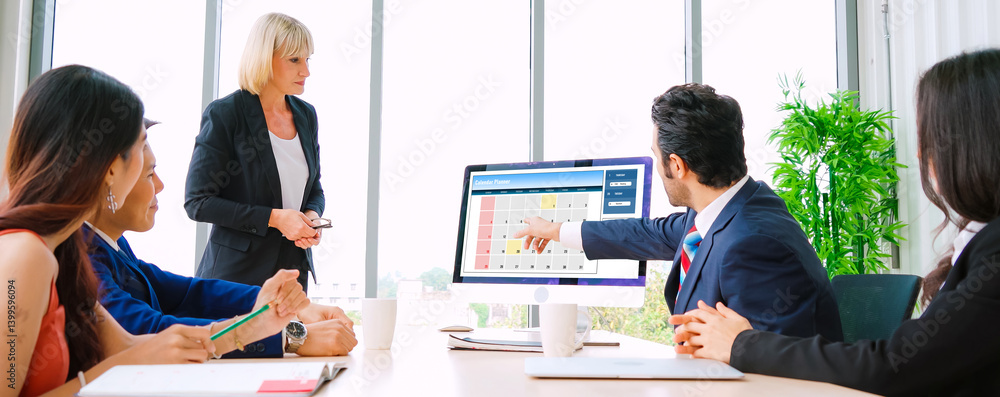 Poster calendar on computer software application for modish schedule planning for personal organizer and on