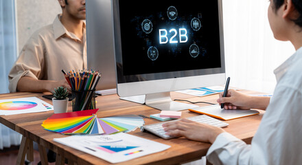 Business person navigates B2B landscape, harness technology to enhance business-to-business...