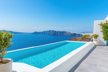 Fototapeta premium Infinity pool overlooks the ocean on sunny Santorini island, Greece. Showcase luxury travel, vacations, relaxation, and Mediterranean lifestyle.