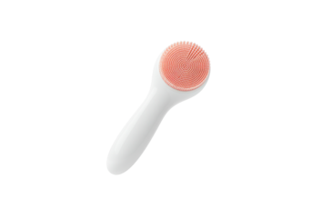 A horizontally floating facial cleansing brush on solid white background