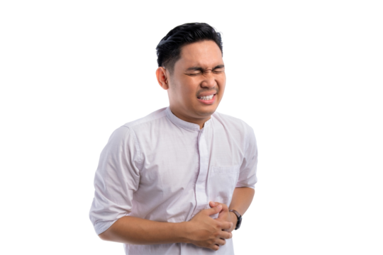 Handsome Asian Muslim man having stomach ache, touching sore stomach isolated on transparent background