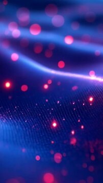 Abstract animation featuring a dynamic  waving dots fluid texture that ebbs and flow glowing defocused particles drift  vertical video