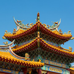 Fototapeta premium Detailed Corner of a Chinese Temple Roof with Intricate Ornamentation 