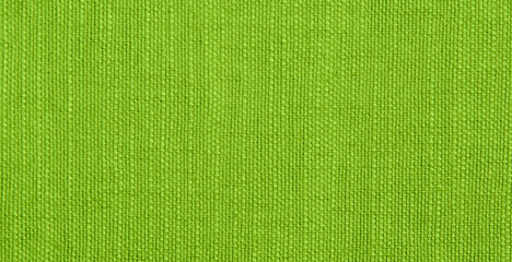 green fabric texture as background