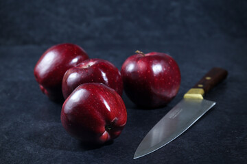 red apples on a dark background