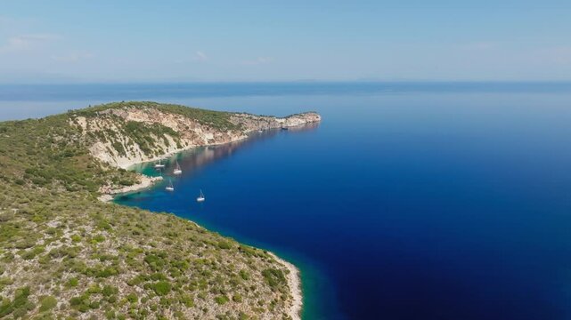 Hulla Beach on Ithaca island. Crystal clear waters meet rocky shores, drone view