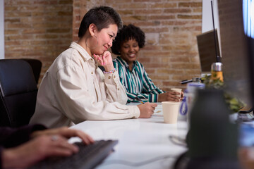 Managers working together in modern office discussing business strategy