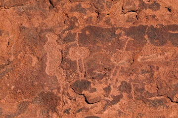 Sehr alte Steinzeichnungen im Fels von Twyfelfountain in Namibia
