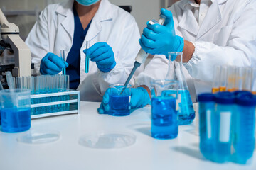 Scientist in laboratory study and analyze scientific sample.