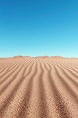 Naklejka premium Sand dunes under a clear blue sky.