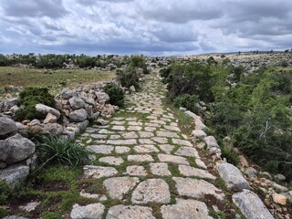 An ancient paved road dating back to the Roman era
