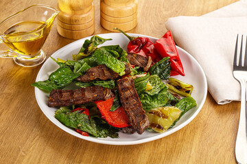 Salad with grilled beef steak
