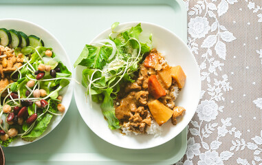 Homemade curry rice chicken stew japanese style serve with healthy green salad