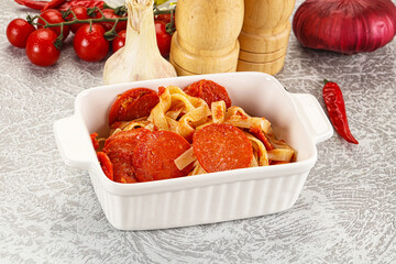 Italian pasta pappardelle with chorizo