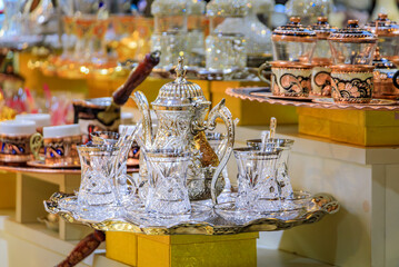 Crystal Zamzam set, ornate teapot and cups at a bazaar stall in Istanbul, Turkey