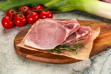 Raw pork steak loin with bone
