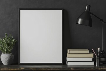 Blank framed poster on dark wooden table with decorative items