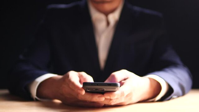Businessman using mobile smartphone finger touching on phone screen, mobile banking, online shopping, social media, chatting with AI, customer support. Concept of technology, digital communication