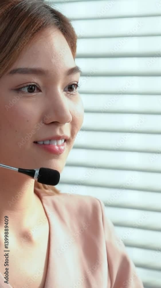 Aufkleber competent female operator working on computer and while talking with clients. concept relevant to bo