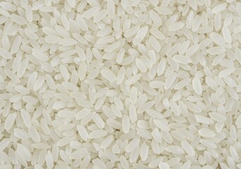 Freshly polished white rice fills the background, perfect for various dishes and cuisines
